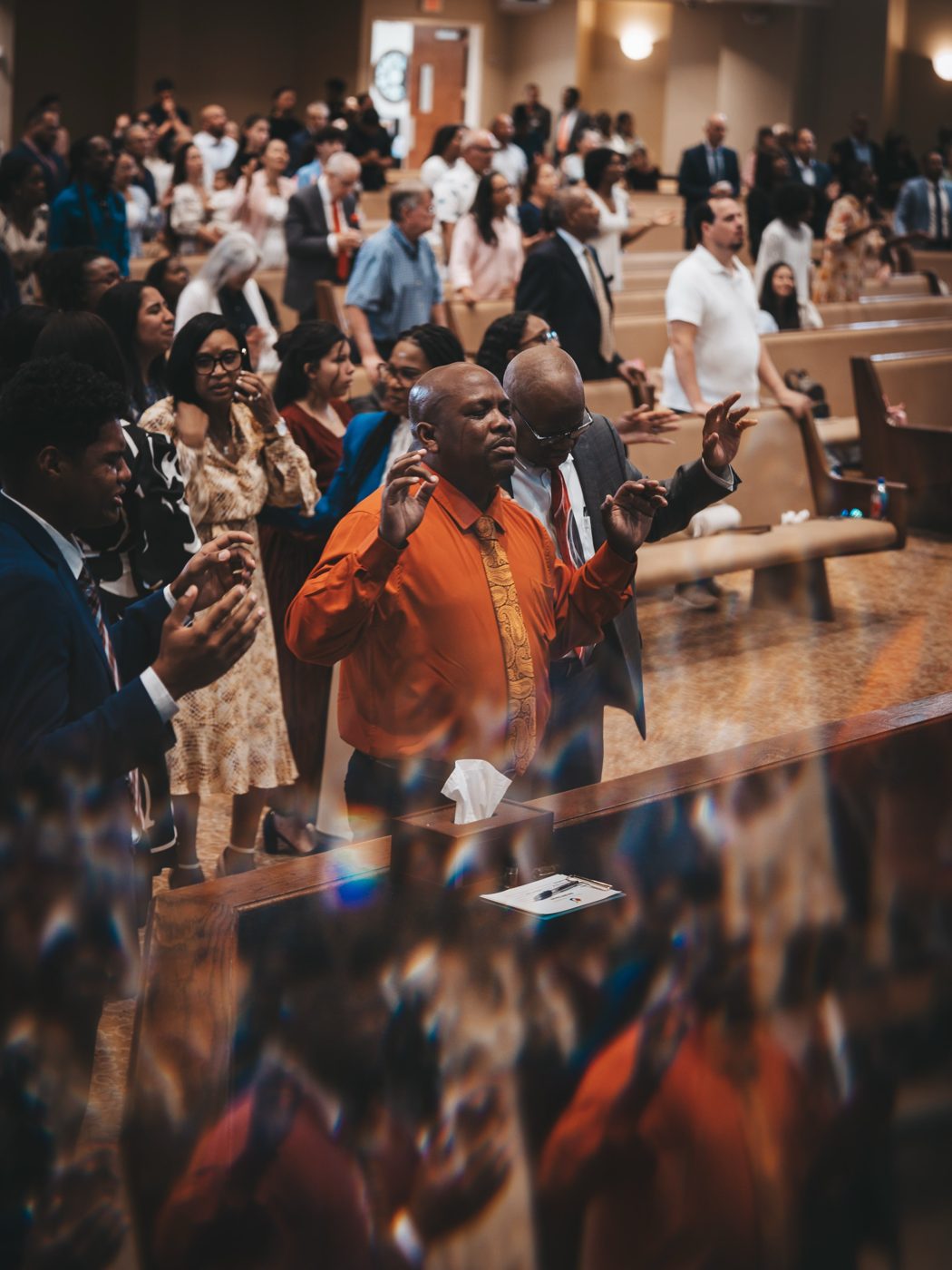 A packed sanctuary worshipping together