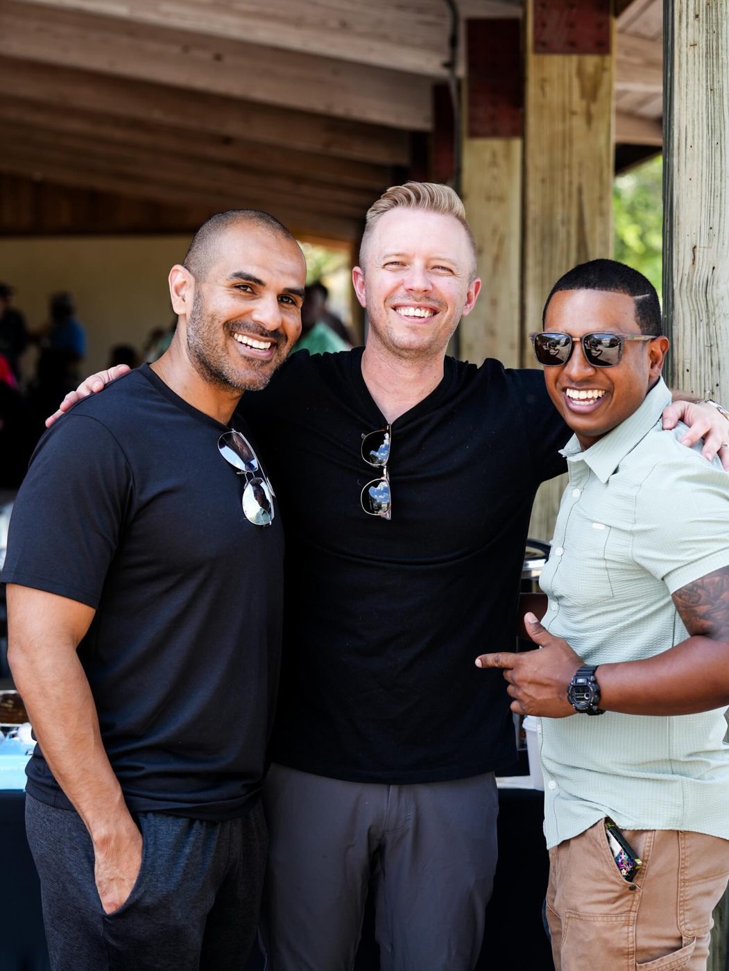 Friends smiling together at the church picnic