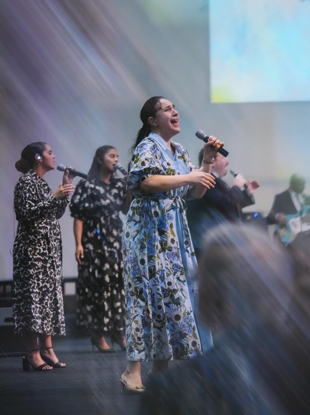 Worship singers leading the congregation